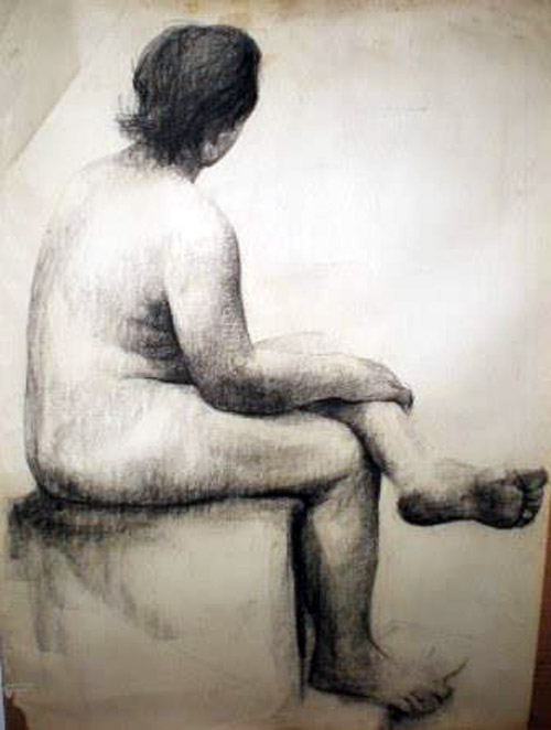 Desnuda Sentada en Piedra